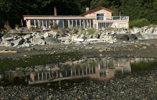 bed and breakfast reflected in tide pool