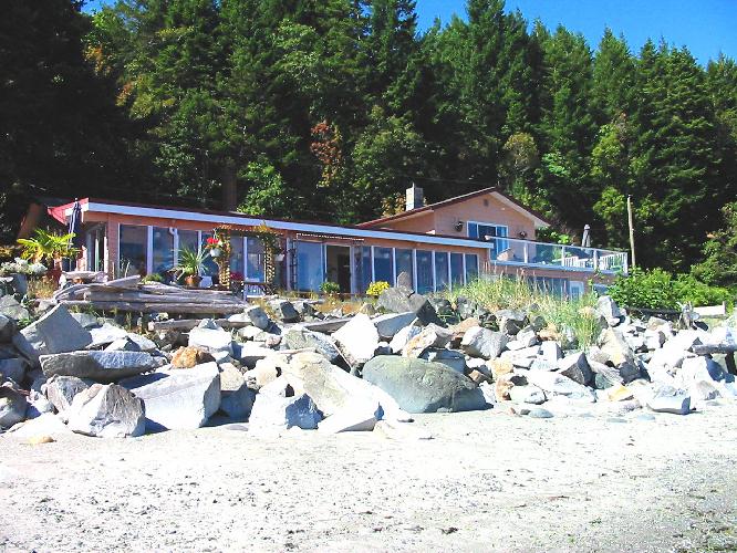 View of bed and breakfast from beach